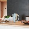 186467 2 smeg rucni mixer pastelova modra scena 02